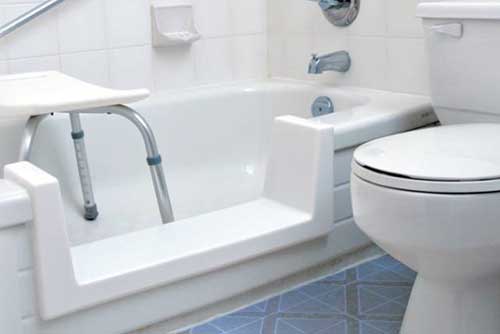 Accessible cutaway bathtub